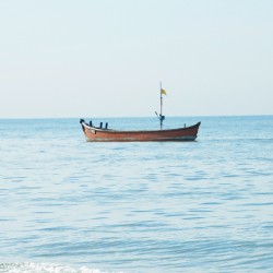 Lone boat-Turtle Bay near Udupi